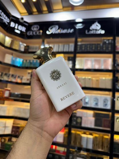 This is Abraaj Revere Eau de Parfum (100ml) — a stylish, budget-friendly fragrance often found in Middle Eastern-style perfume collections. (Allaow to open)