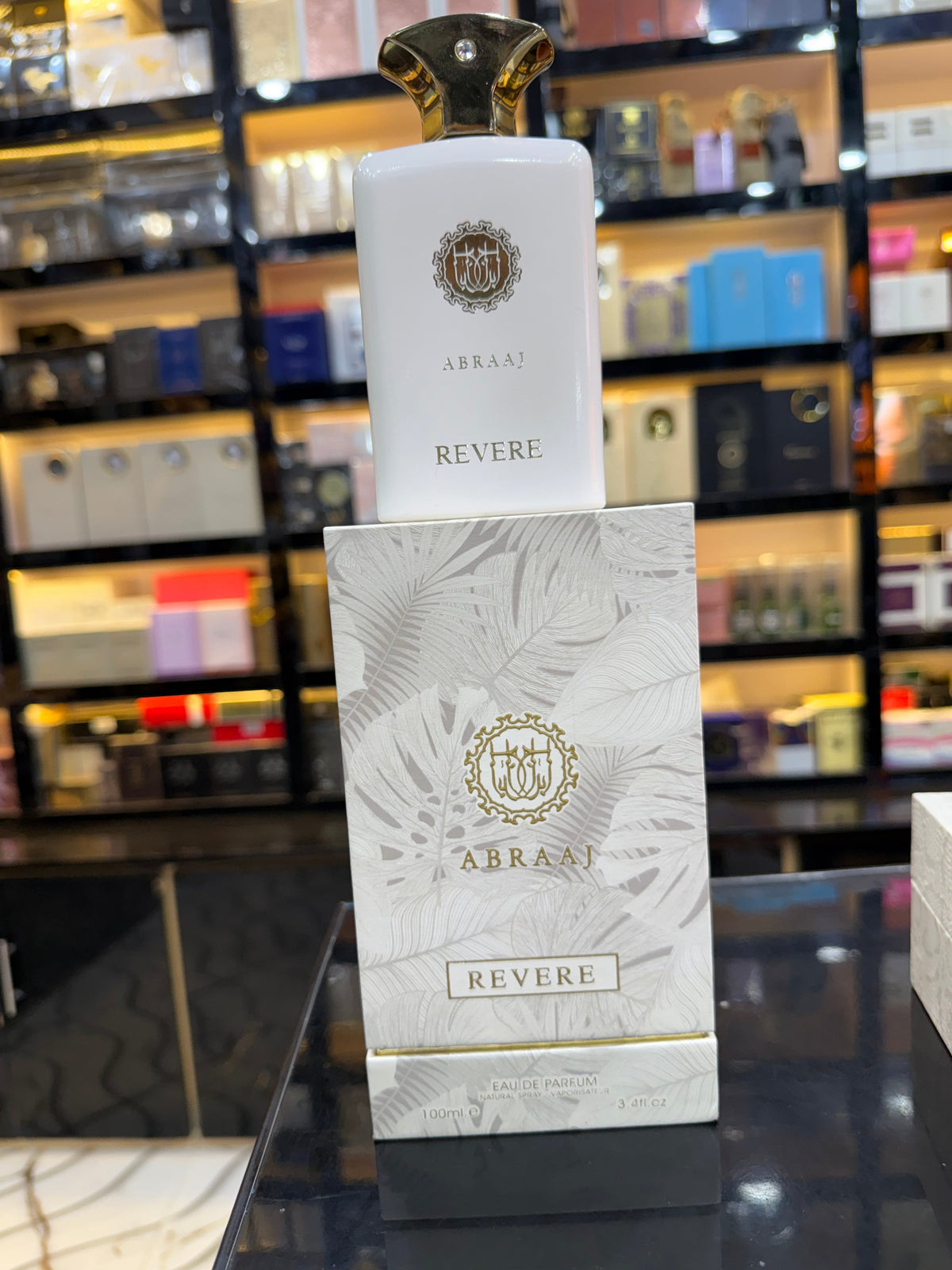 This is Abraaj Revere Eau de Parfum (100ml) — a stylish, budget-friendly fragrance often found in Middle Eastern-style perfume collections. (Allaow to open)