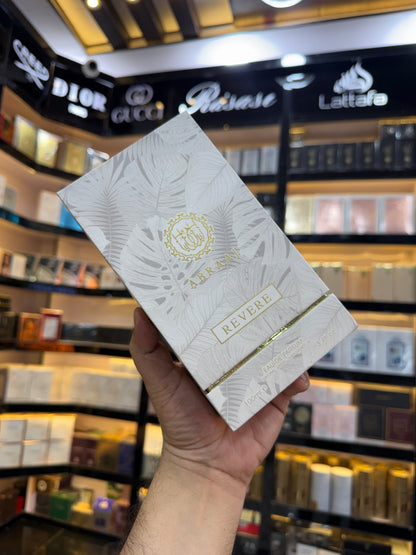 This is Abraaj Revere Eau de Parfum (100ml) — a stylish, budget-friendly fragrance often found in Middle Eastern-style perfume collections. (Allaow to open)