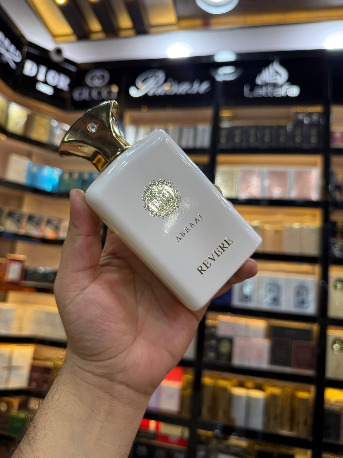 This is Abraaj Revere Eau de Parfum (100ml) — a stylish, budget-friendly fragrance often found in Middle Eastern-style perfume collections. (Allaow to open)